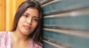 A woman experiencing emotional issues after an abortion